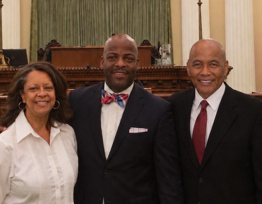 Joe Bowers with Margaret Richards-Bowers and Assemblymember Isadore Hall III at the State Capitol